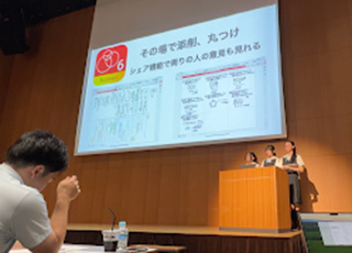 今年8月、KDDI様主催イベントで本校の高校３年生が発表を行いました